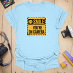 T-Shirt With Bold Smile Signage And Cheeky Photo Humor