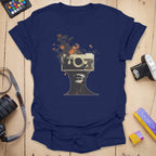 T-Shirt With Surreal Camera And Wildflower Artwork