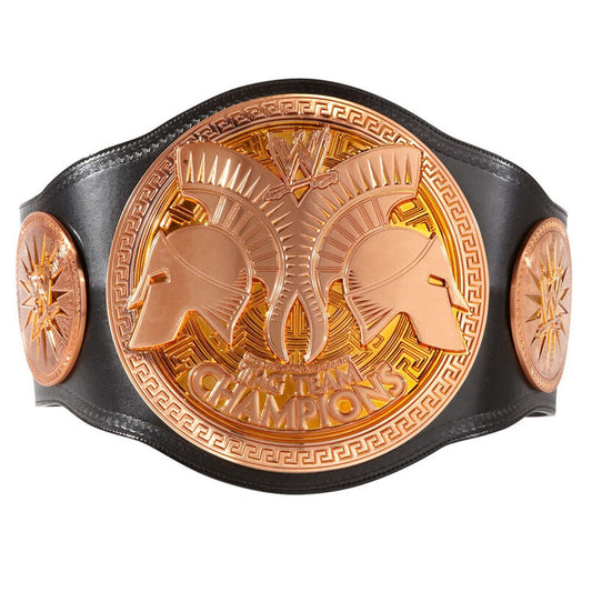 WWE tag team championship belt with gold Spartan helmet design on black leather strap